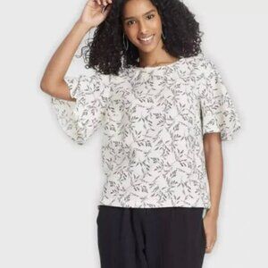 ACCEPTING ALL OFFERS! A New Day White top with black flowers flare sleeves XL